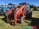 1973 Ford 7000 2wd tractor with Farmhand F12C front loader. Reg No: XVW 207L. Hrs: 7,053. Loader