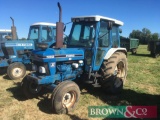 1990 Ford 7810 Series III 2wd tractor on 9.00-16 front and 420/85R38 rear wheels and tyres. Reg No:
