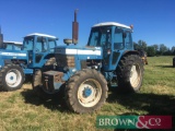 1983 Ford 8210 Dual Power 4wd tractor with 11No. 45kg front wafer weights and Q cab. Reg No: A192