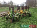 1996 Dowdeswell DP100S 5 furrow (3+1+1) reversible plough with hydraulic vari-width. Serial No: