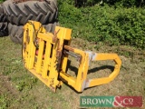 Farm made bale squeezer with JCB brackets