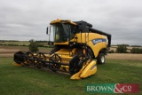2012 New Holland CX6080 combine harvester with 20ft header, straw walkers on 800/65R32 front and