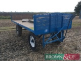 Pettit 4 wheel wooden trailer with sides