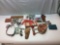 Assorted box lot of firearm related commemorative/vintage toys and nick-kna