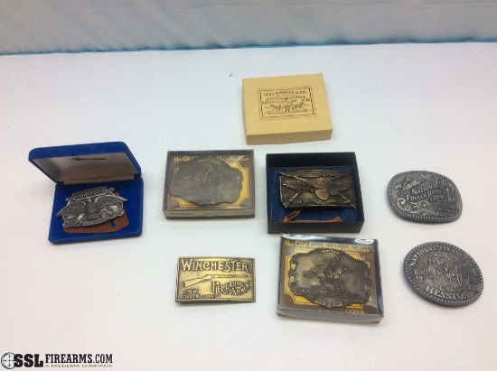 Lot of (7) collectible/commemorative belt buckles including: Winchester, It