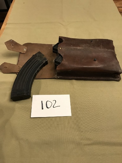 four Czech AK47 ammo Clips and leather pouch