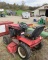 Wheelhorse 520-H lawn tractor with mower, snowblade, and tire chains