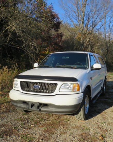02 Ford F150 72,394 miles, vin#1FTRX17W62NA59479 has truck cap title