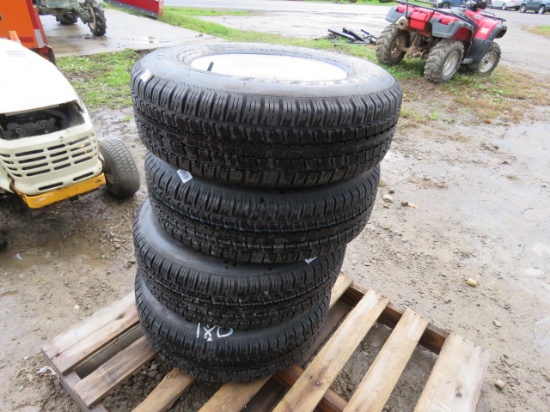 Provider ST 225/75R15 trailer tires w/ white rims - this is 4 times the money