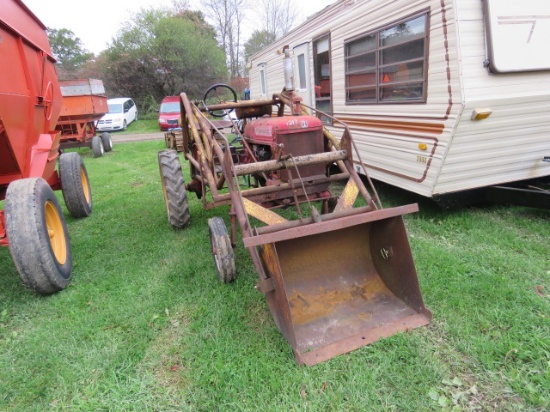 McCormick Farmall cub tractor with bucket