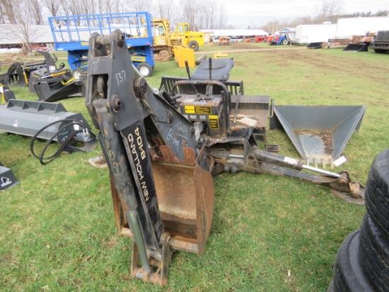 NH B104 backhoe attachment