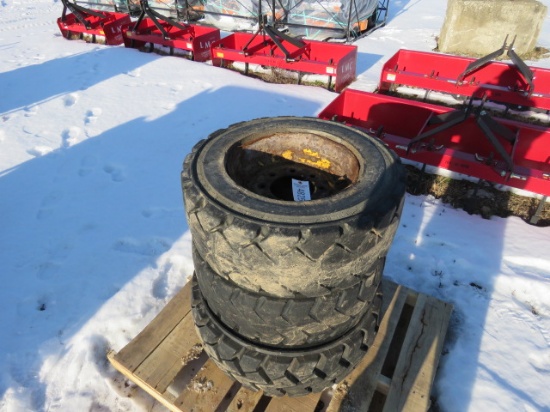 SET OF NEW HOLLAND SKID STEER TIRES USED