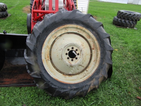 1 GOOD YEAR 12.4-28 TRACTOR TIRE ON 8 LUG RIM