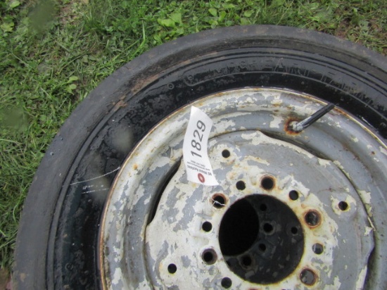 2 MCREARY FARM TIRES ON 6 LUG RIM