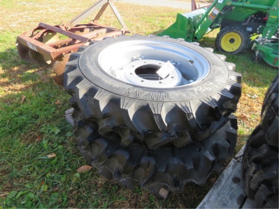 2 TITAN HI TRACTION 9.5-24 TIRES ON RIMS-BRAND
