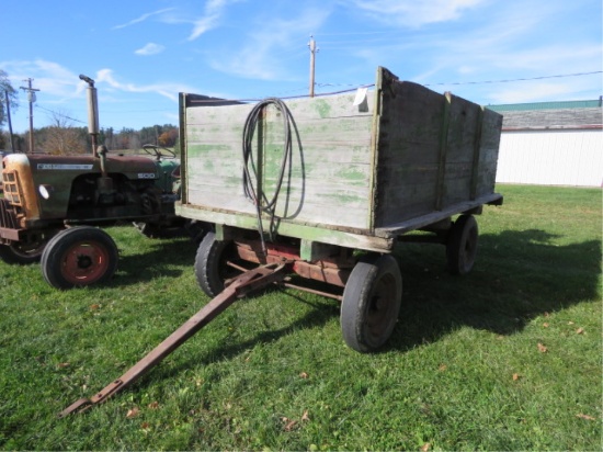 HYDRAULIC DUMP WAGON WITH MCCORMICK SEEDER ON BACK