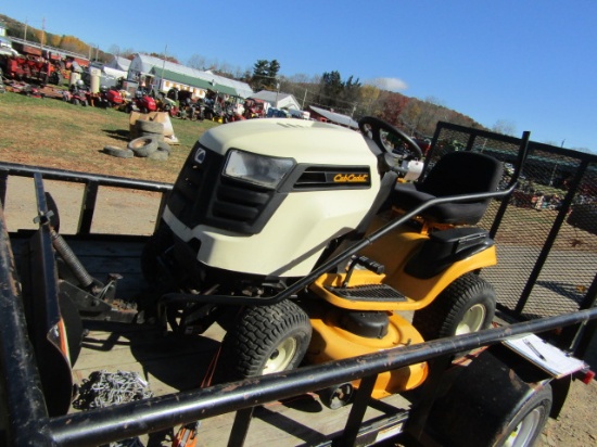CUB CADET LAWN MOWER WITH PLOW AND CHAINS
