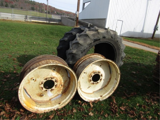 SET OF TIRES & RIMS 13-628 FOR A FORD BACKHOE