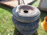 GROUP OF MISC TIRES ON RIMS
