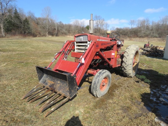 MCCORMICK FARMALL 560 DIESEL WITH THE CB LINE 800 WORKMASTER LOADER