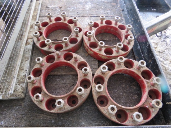 4- 2" WHEEL SPACERS, USED FOR A SKIDSTEER
