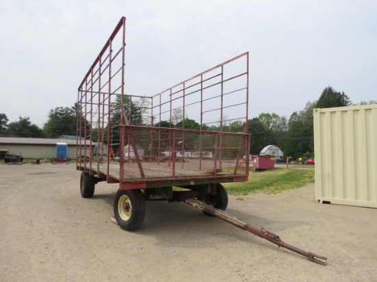 SQUARE BALE WAGON ON GEHL RUNNING GEAR WITH EXTENDABLE TONGUE
