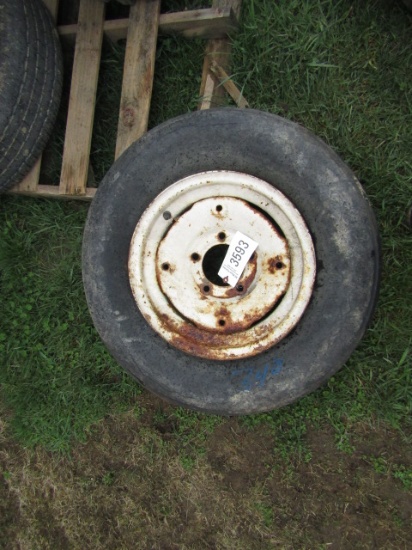 IMPLEMENT TIRE 7.5L-15SL ON 6 LUG RIM