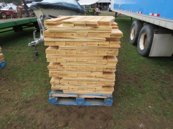 PALLET OF LUMBER DOG EAR FENCE POSTS