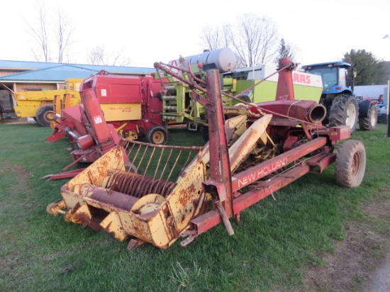 NEW HOLLAND 717 CHOPPER WITH CORN & HAY HEADS