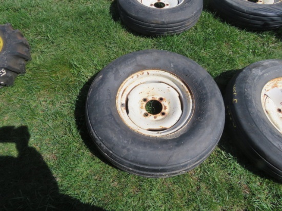 FIRESTONE FARM IMPLEMENT 9.5L-14 TIRE ON 4 LUG RIM