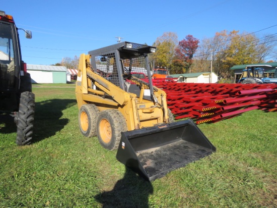 CASE 1840 SKIDSTEER WITH TOMAHAWK 66" BUCKET