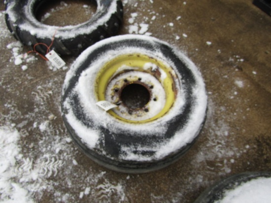 IMPLEMENT TIRE ON 8 LUG RIM