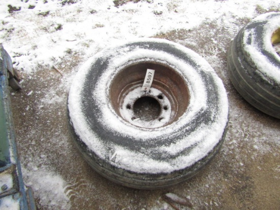 IMPLEMENT TIRE ON 8 LUG RIM