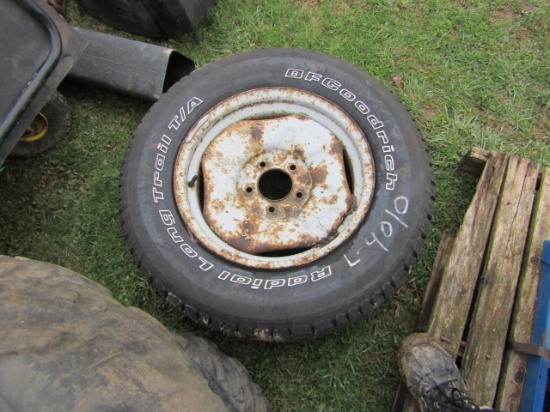 17" TIRE AND RIM - ALMOST NEW