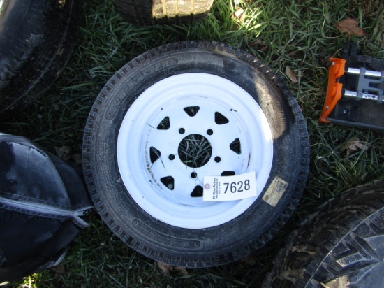 4.80-12 TIRE ON A 5 LUG RIM