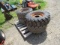 4 10-16.5 SKIDSTEER TIRES ON RIMS USED