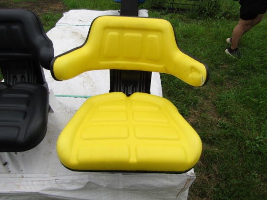 NEW YELLOW TRACTOR SEAT HAS TEAR IN ARM