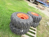 4 NEW GLADIATOR 12-16.5 SKIDSTEER TIRES ON BOBCAT