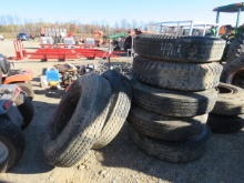 7 10.00-20 TIRES ON RIMS