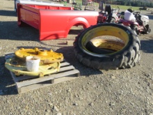 2 JOHN DEERE RIMS WITH 12.4 - 38 TIRES