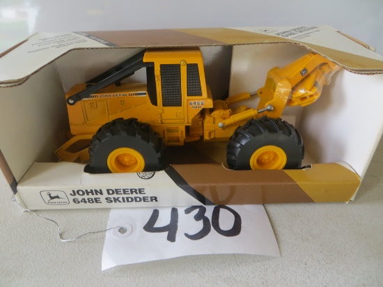 Ertl	John Deere 648E Skidder, Turbo, front blade raises & lowers		1/32"