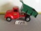 Tonka dump truck w/dumping mechanism, and end gate	played w/condition	Tonka