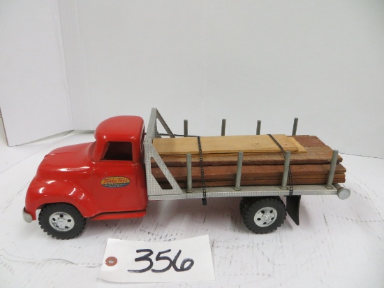 Tonka	Truck w/flat bed lumber hauler
