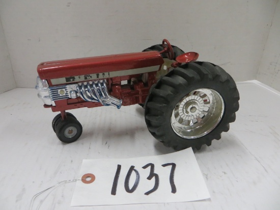 Farmall pulling tractor