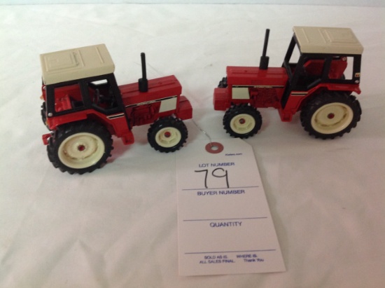2 International tractors   1/32 scale