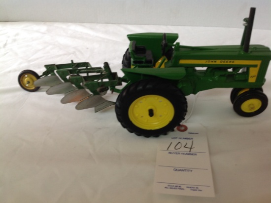 JD 720 w/3 bottom plow