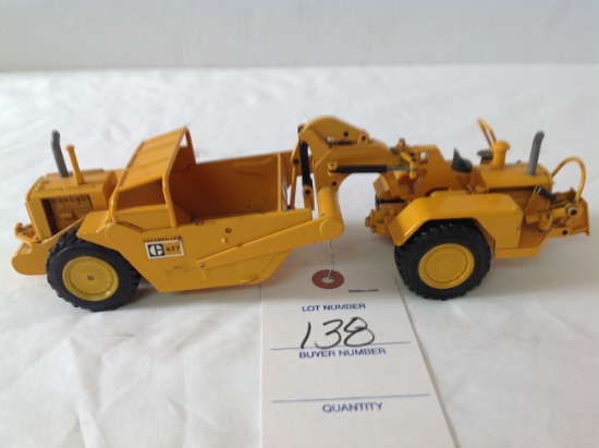 Caterpillar dirt scraper