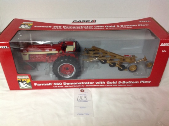 Farmall 560 Demonstrator w/Gold 5 bottom plow  National Farm Toy Museum