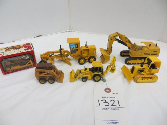 assortment of construction equipment, hoe, backhoe, grader and more