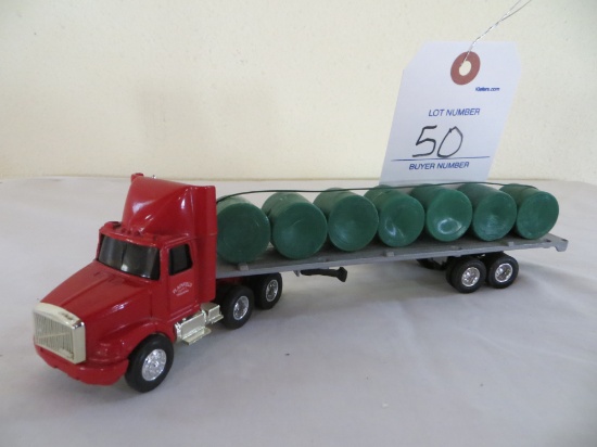 Plainfield Trucking Semi and  Round bale hauler trailer